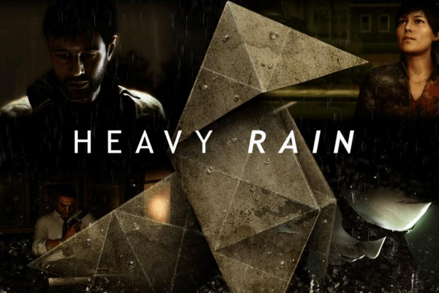 Okładka gry. Duża figurka origami. W tle portrety mężczyzny i kobiety. Ciemne i brązowe barwy. Na środku napis "Heavy Rain".
