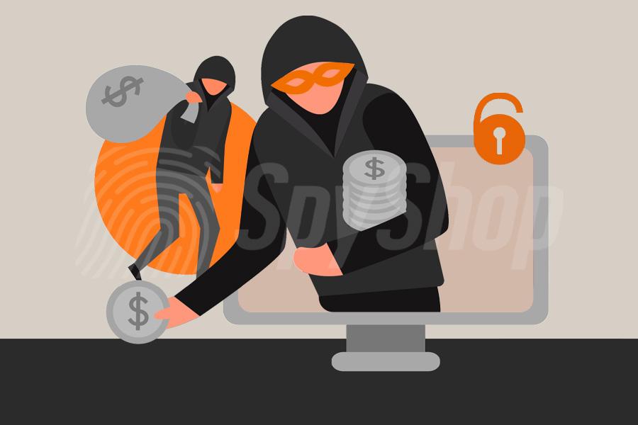 Grafika przedstawiająca zamaskowanych złodziei w ekranie komputera.